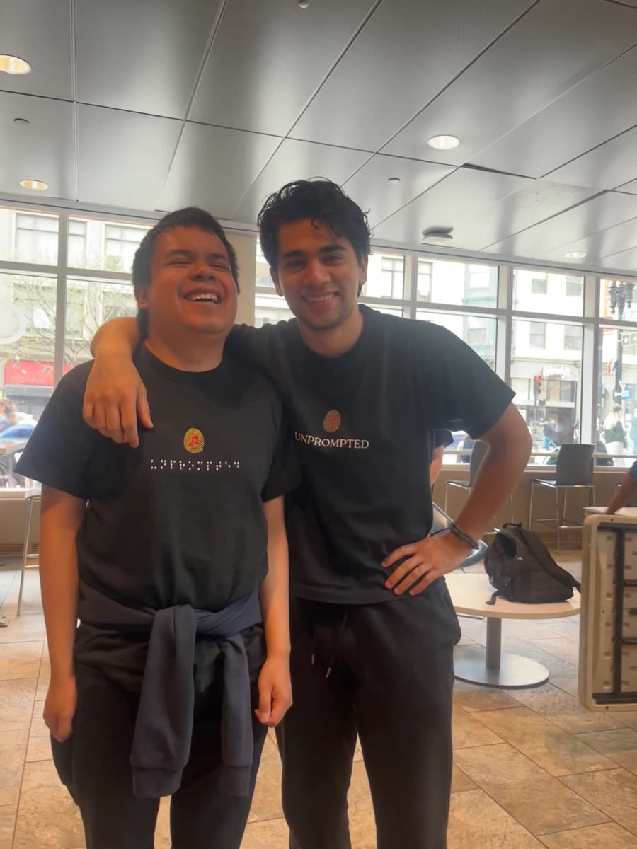 Two musicians smiling together